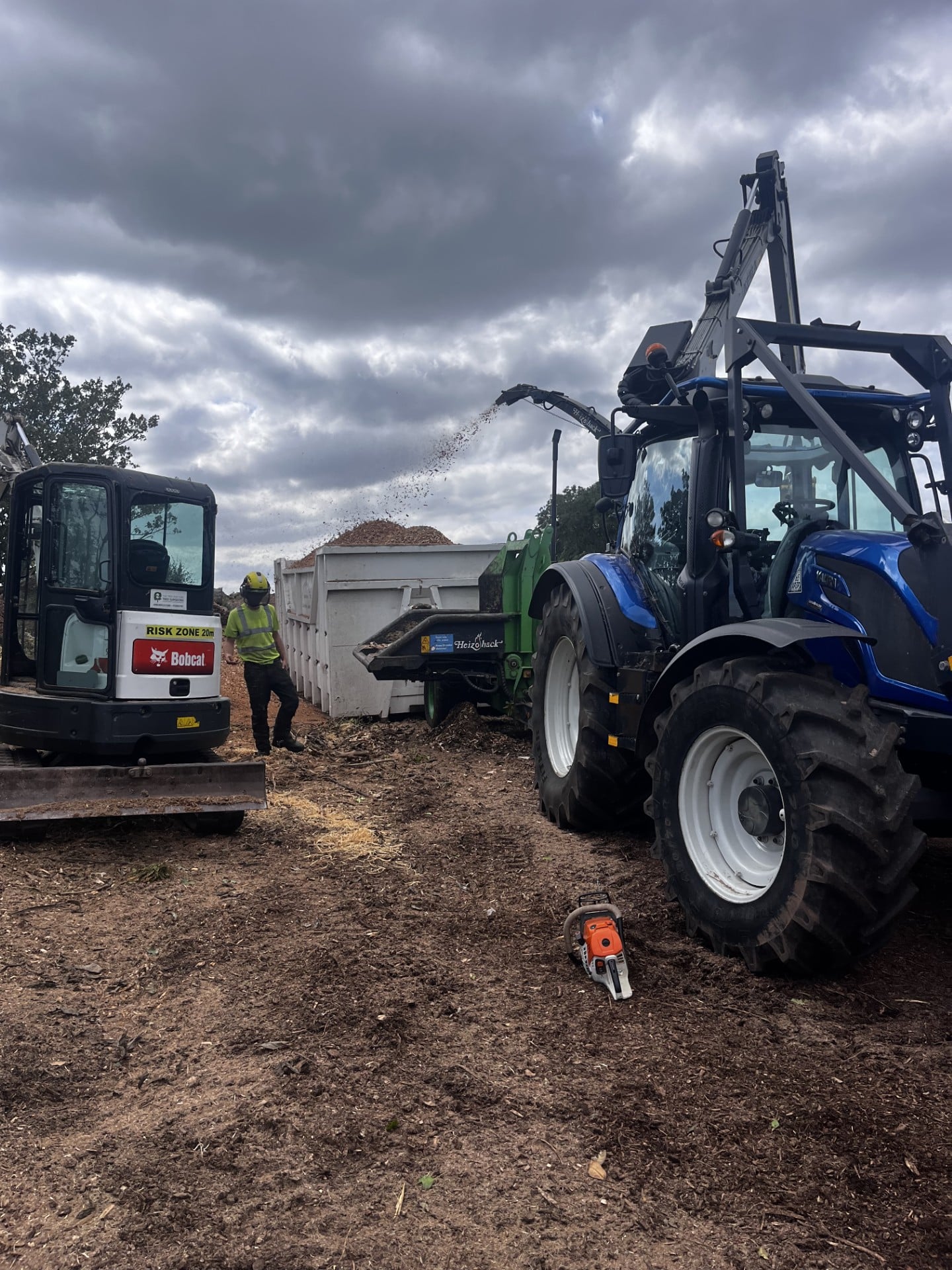 mulching biomass with tractor